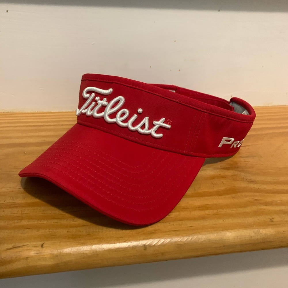 Women’s red Titleist visor